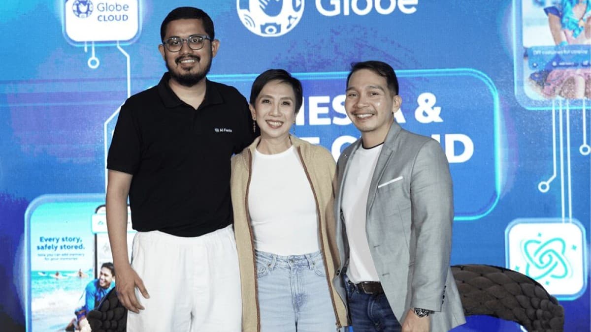 Three executives from AI Fiesta and Globe Telecom standing together at the AI Fiesta launch