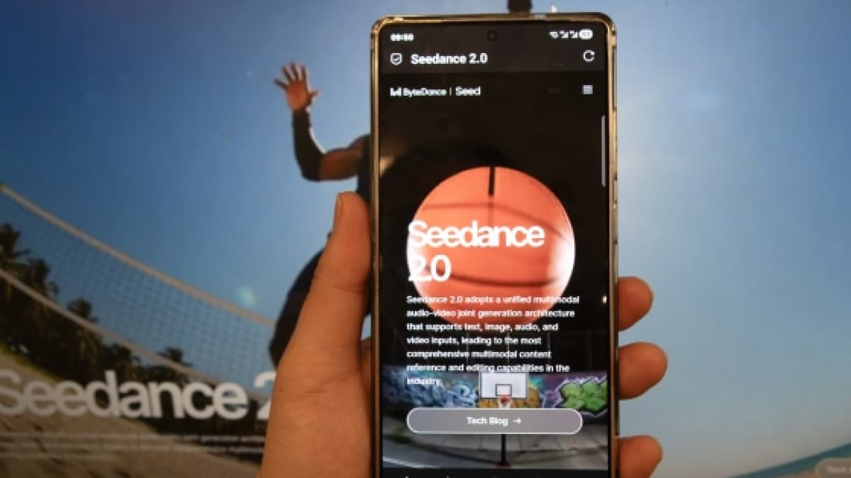 Hand holding a smartphone displaying ByteDance's Seedance 2.0 announcement page