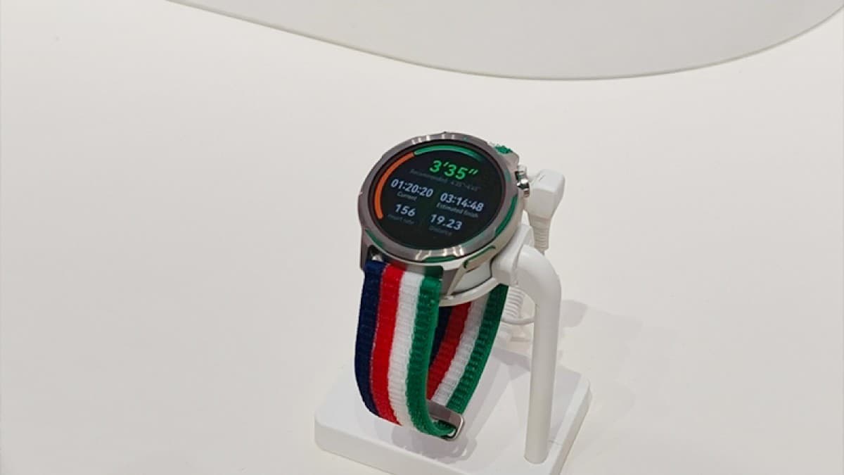 HUAWEI Watch GT Runner 2 Racing Legend smartwatch with a blue, red, white and green nylon strap